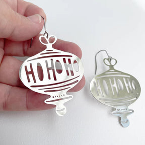 DENZ Ho Ho Ho in Silver, held by hand