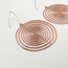 DENZ Orbit dangles (flat) in rose gold, angled view