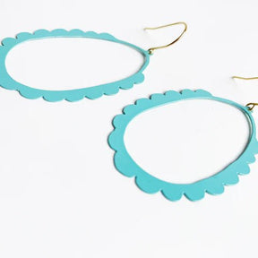  DENZ Scallop Hoops in pale aqua - painted steel dangles, angled view