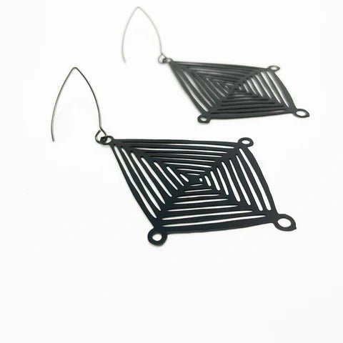 DENZ Shield dangles in black, angled view