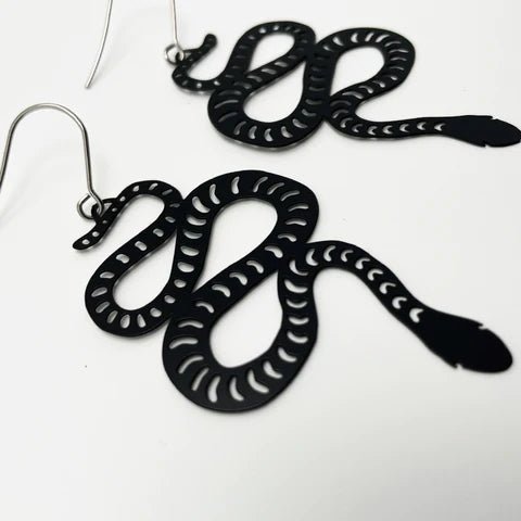 DENZ Snake dangles in black, angled view