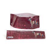 Two Modgy Whippet Good Expandable and Collapsible Travel Dog Water Bowl with a maroon base color and a graphic design of a whippet dog. One bowl is shown with the zip closed and the other with the zip open displaying the bowl's interior.