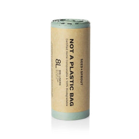 Seed & Sprout roll of 8L sage green compostable bin liners wrapped in a kraft paper sleeve stating "Not A Plastic Bag".