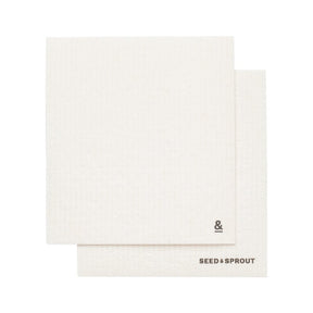 Seed & Sprout cellulose sponge cloth set of 2 in cloud white featuring minimal black logo branding.