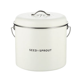 Seed & Sprout kitchen compost bin in mushroom white featuring a vented lid, side handles, and subtle brand logo.