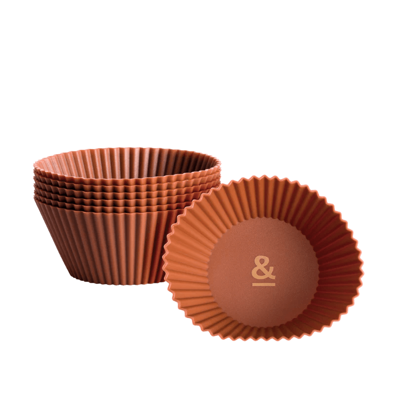 Seed & Sprout large silicone muffin cups in cocoa set of 6, featuring a stacked column and a single cup displaying the brand's "&" logo.