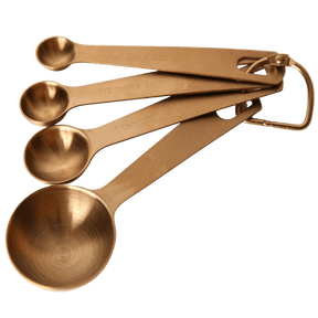 Seed & Sprout brass-toned stainless steel measuring spoon set of four linked on a removable ring.