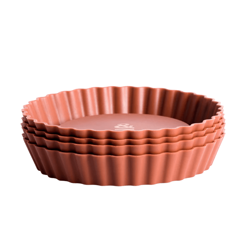 Seed & Sprout terracotta silicone mini pie dishes stacked neatly in a set.