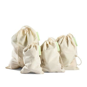 Seed & Sprout Organic Bulk Food Bags - Set of 4 with cinched drawstring tops arranged side by side.