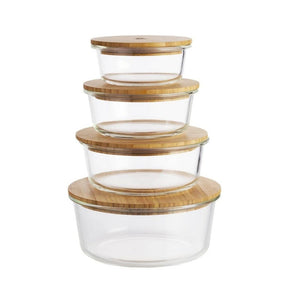 Seed & Sprout 4-piece Round Eco Stow glass food container set with bamboo lids stacked vertically.