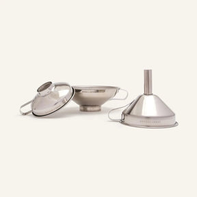 Seed & Sprout stainless steel funnel set of 3 displaying different sizes with engraved branding.