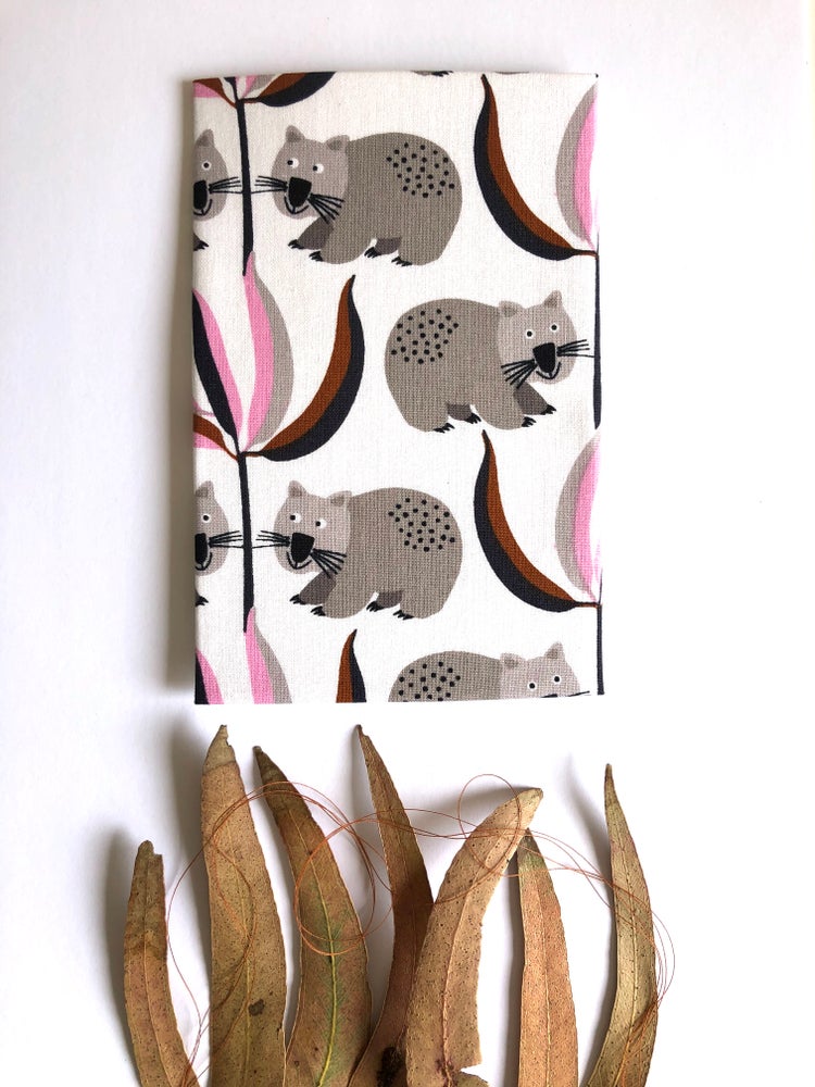 WOMBAT - Pookipoiga